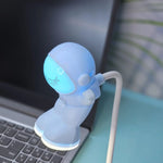 أبجورة مضيئة بتصميم رجل فضاء